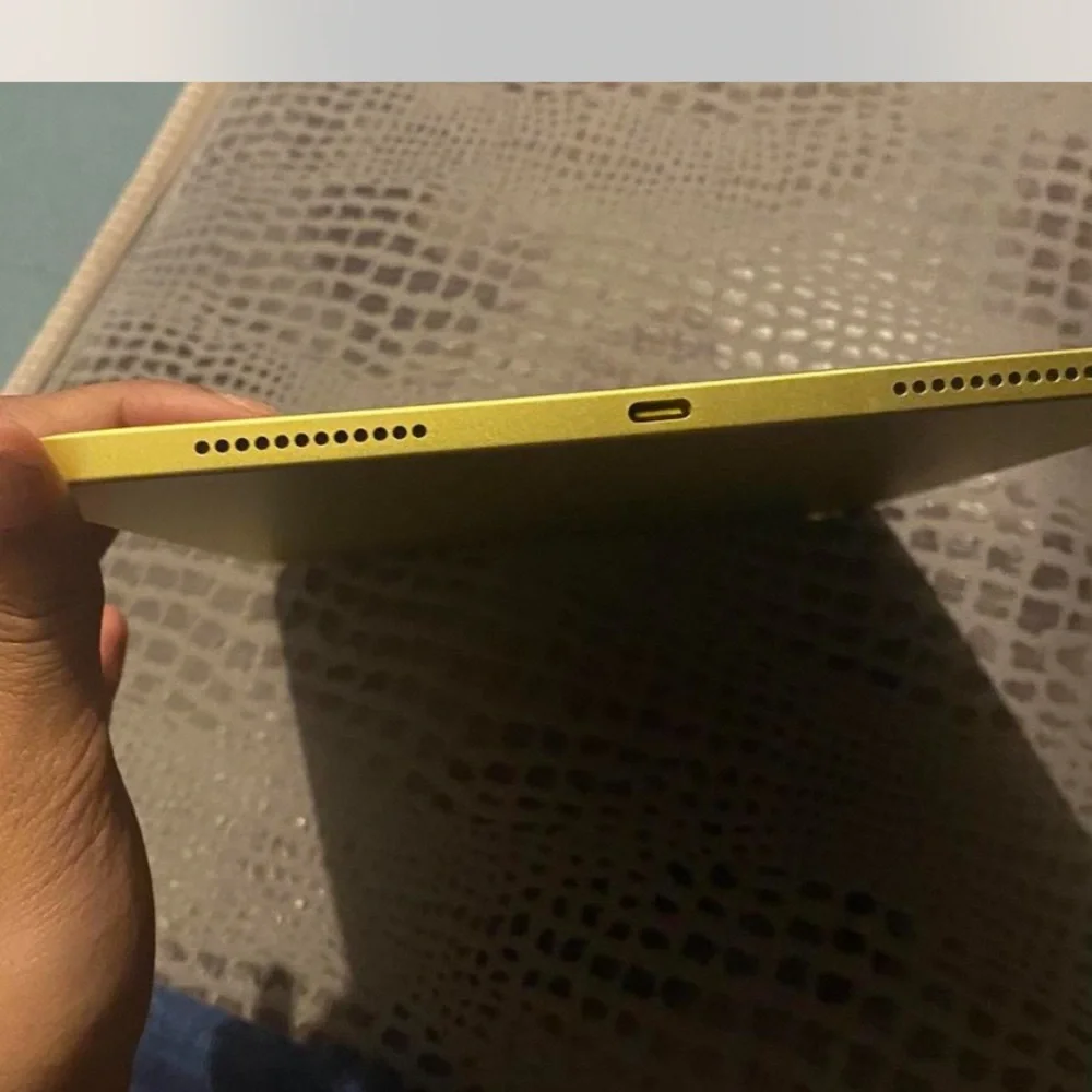 Apple Black and Yellow Tablet Sleek Design